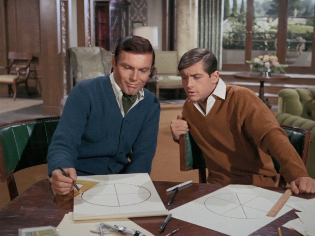 Bruce hilft Dick bei den Hausaufgaben